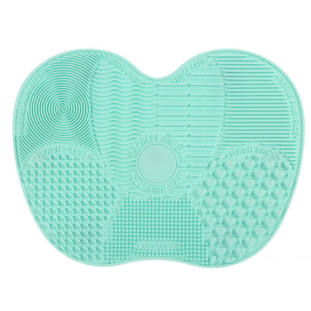 Brush cleaning mat suction pad in use