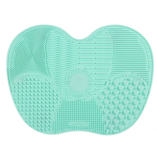 Brush cleaning mat suction pad in use